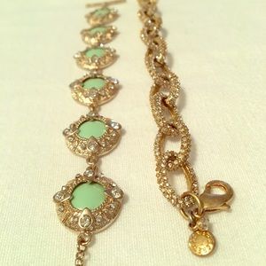 A pair of glitzy bracelets